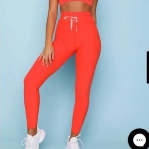 White Fox Orange High Waisted Leggings/Joggers Medium